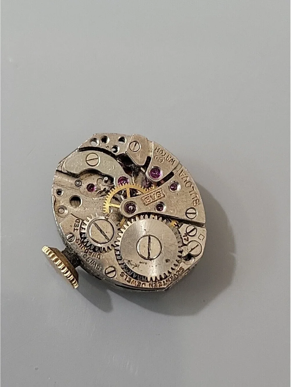 Bulova Swiss watch movement 12.8mm x 15.4 For Parts Or Repairs As Is L74